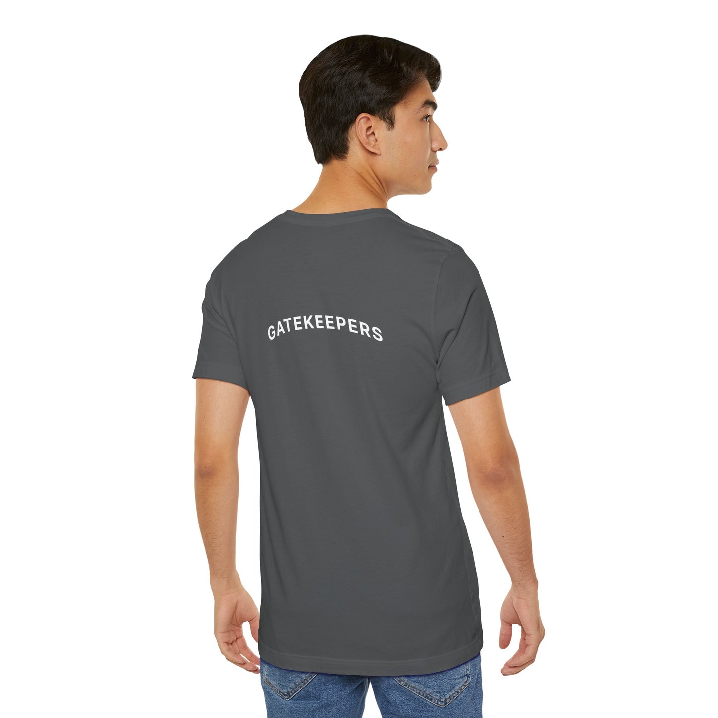 Person wearing a asphalt t-shirt with 'GATEKEEPERS' text on the back, standing against a white background