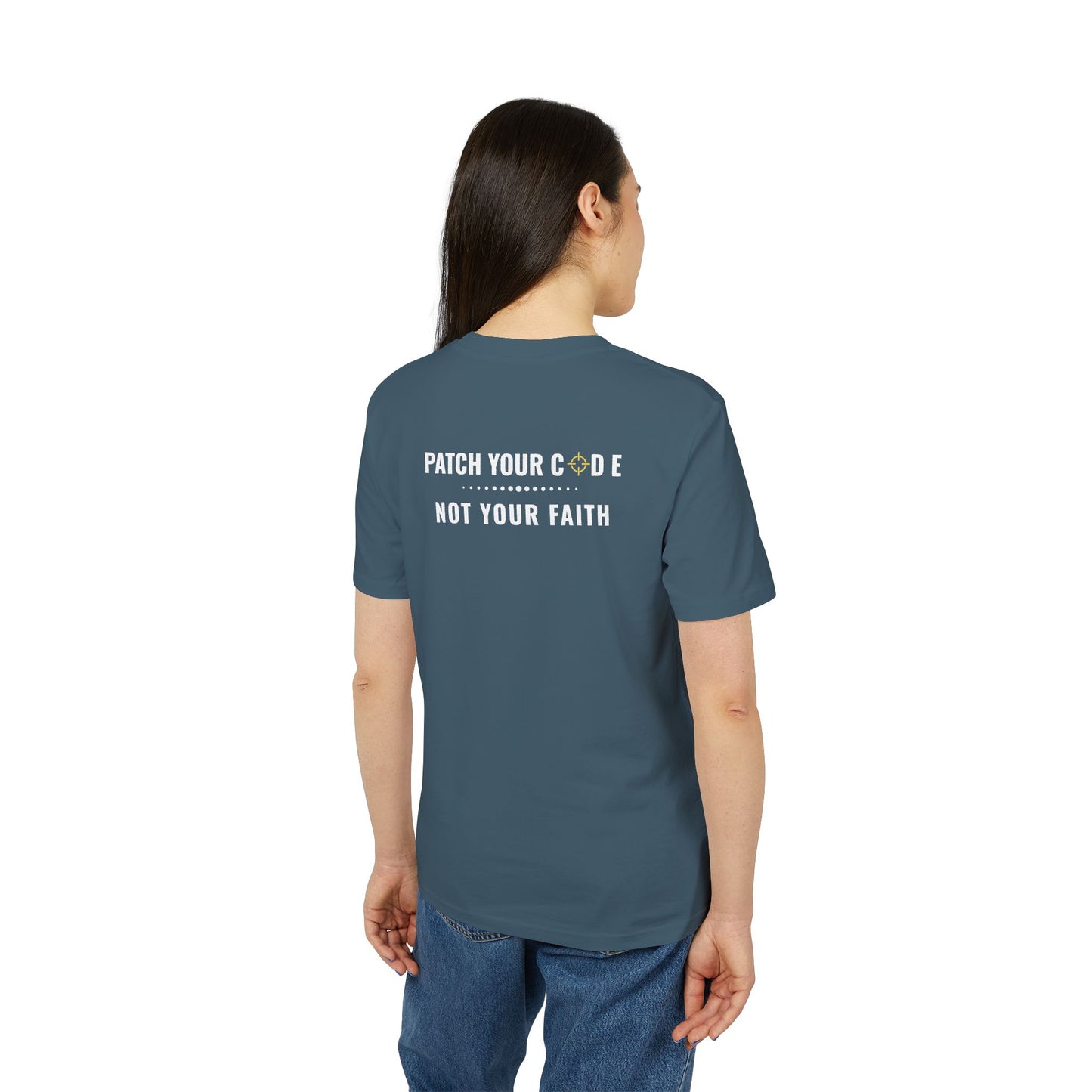 Person wearing a blue t-shirt with text on the back, standing against a white background