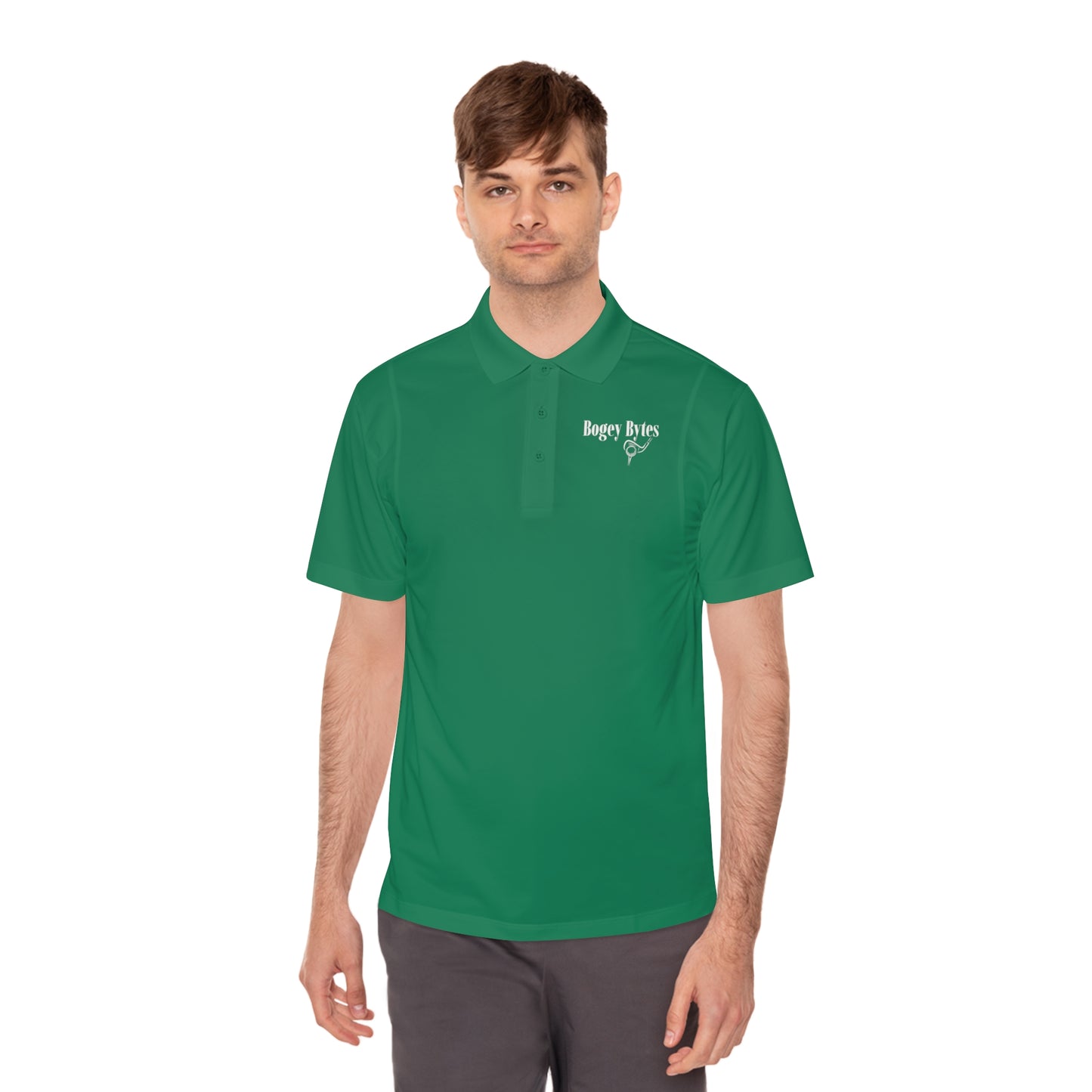 Man wearing a stylish kelly green polo shirt, smiling confidently