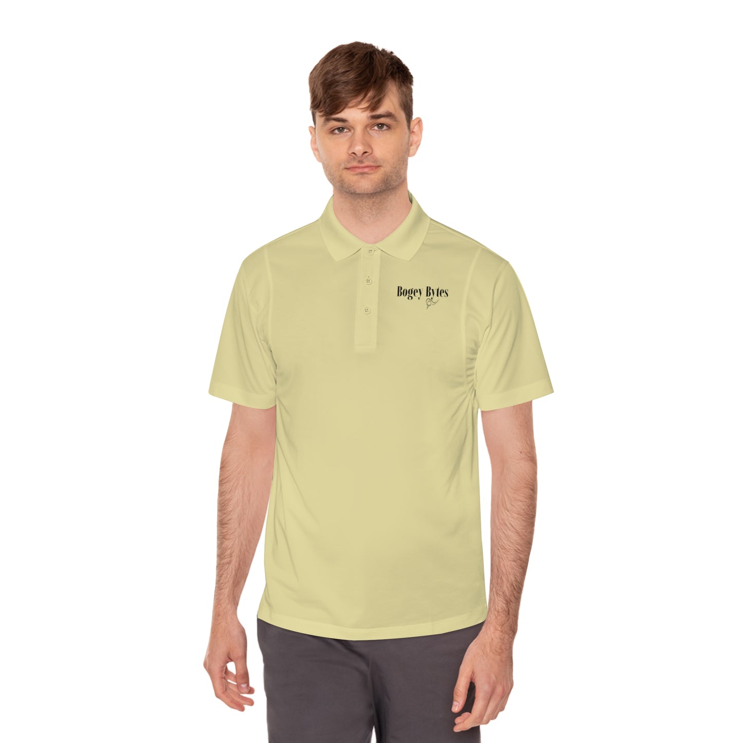 Man wearing a vegas gold polo shirt, looking relaxed and confident