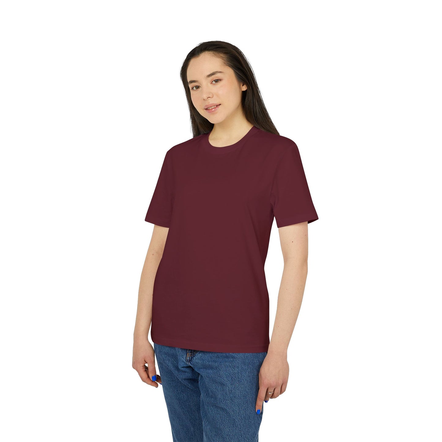 Person wearing a maroon t-shirt and blue jeans on a white background