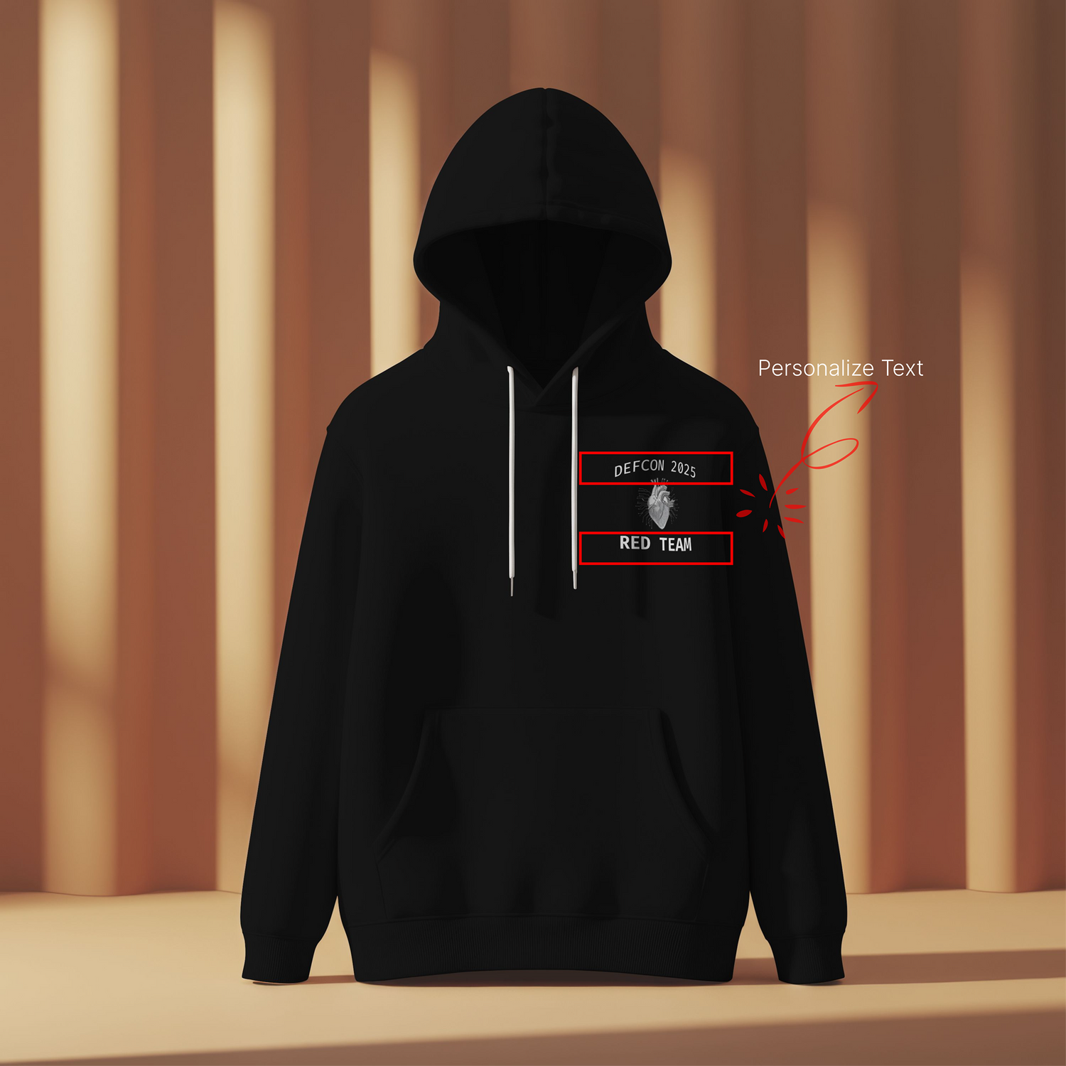 Black hoodie with text design on a neutral background